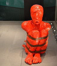 A sculpture by French artist François Piquet on the theme of slavery in the Caribbean titled, “Timalle,” is displayed at the International Slavery Museum in Liverpool, England.