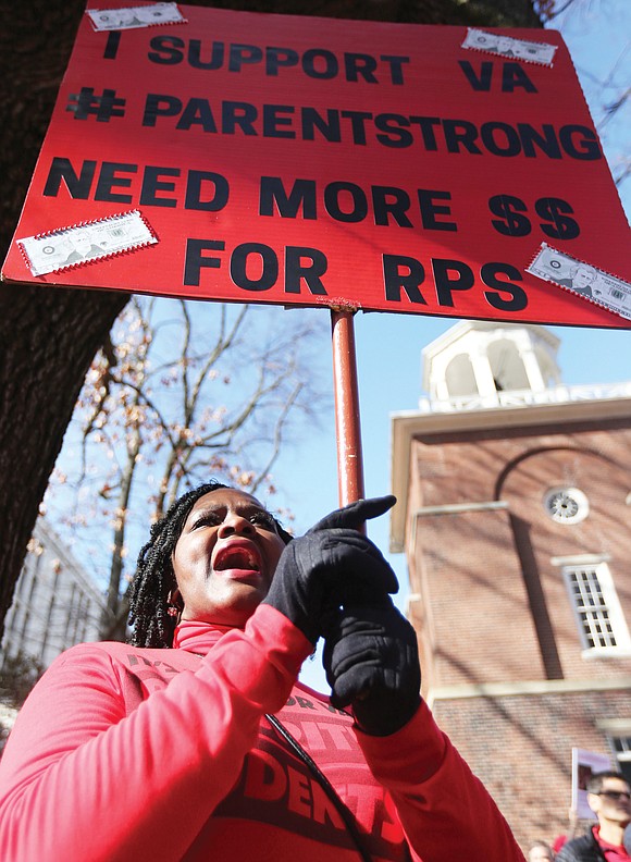 The State Capitol echoed with the chants “Fund Our Future!” and “Red4Ed!” as educators, students and their supporters gathered in ...