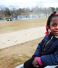 Spring-like weather this week led many people outside to enjoy the days before rain and chilly winter temperatures return. Shaya Scott, 5, perches on a bench at Swan Lake in Richmond’s byrd Park where she was enjoying the weather, the ducks and Canada geese Tuesday with her parents, Shalaya and Larry Mceachin Jr., and her sisters.