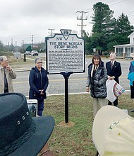 Irene A. Morgan’s niece, Cleo Warren, center left, and daughter, Brenda M. Bacquie, unveil the historic marker last Saturday in Hayes. With them are from left, Ben Borden, a longtime Hayes resident, and Jim Hare, director of the survey and register division of the Virginia Department of Historic Resources.