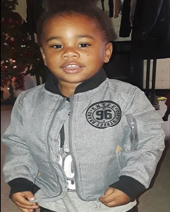 A candlelight vigil in memory of 3-year-old Sharmar L. Hill Jr., who was fatally shot while playing last Saturday afternoon …