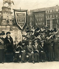 Members of the Equal Suffrage League of Virginia pose in front of the equestrian statue of George Washington in Richmond’s Capitol Square in 1915.