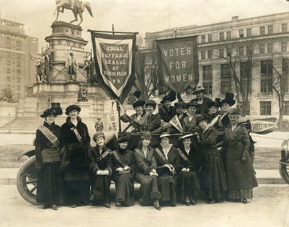 Members of the Equal Suffrage League of Virginia pose in front of the equestrian statue of George Washington in Richmond’s Capitol Square in 1915.