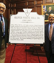 Two Richmond lawyers, Oliver W. Hill Sr. and Spottswood W. Robinson III, who were at the center of the battle for civil rights, are being remembered with state historic markers. Dr. Oliver W. Hill Jr. stands beside the marker to his late father that was unveiled in a ceremony Feb. 6 at the Lewis F. Powell Jr. United States Courthouse in Downtown. With him is J. Maurice Hopkins, a member of the Midlothian-based Oliver White Hill Foundation.