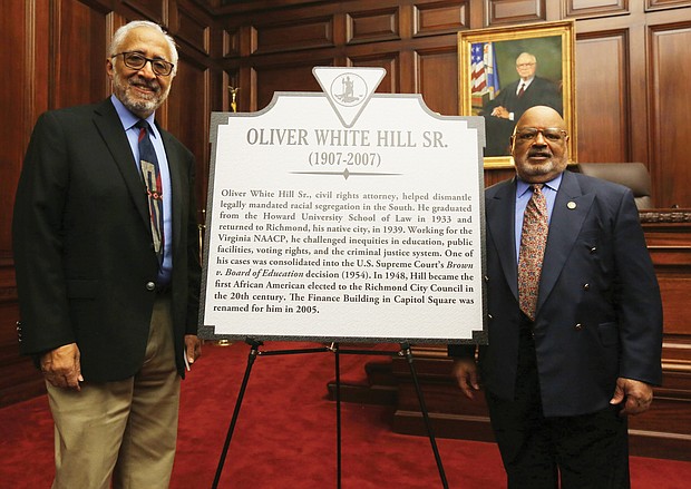 Two Richmond lawyers, Oliver W. Hill Sr. and Spottswood W. Robinson III, who were at the center of the battle for civil rights, are being remembered with state historic markers. Dr. Oliver W. Hill Jr. stands beside the marker to his late father that was unveiled in a ceremony Feb. 6 at the Lewis F. Powell Jr. United States Courthouse in Downtown. With him is J. Maurice Hopkins, a member of the Midlothian-based Oliver White Hill Foundation.