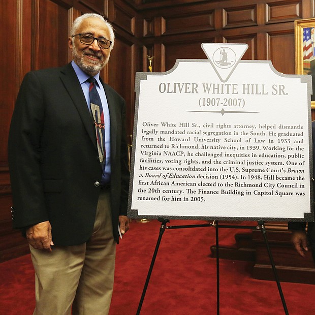 Two Richmond lawyers, Oliver W. Hill Sr. and Spottswood W. Robinson III, who were at the center of the battle for civil rights, are being remembered with state historic markers. Dr. Oliver W. Hill Jr. stands beside the marker to his late father that was unveiled in a ceremony Feb. 6 at the Lewis F. Powell Jr. United States Courthouse in Downtown. With him is J. Maurice Hopkins, a member of the Midlothian-based Oliver White Hill Foundation.