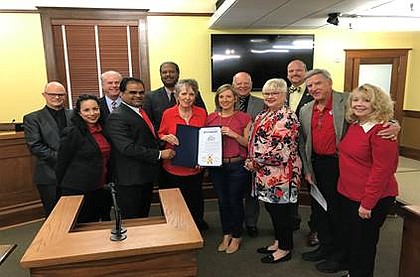 Fort Bend County Judge K.P George along with members of Commissioners Court and local members of the American Heart Association.