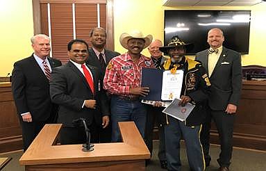 Fort Bend County Judge K.P George along with members of Commissioners Court, Larry Callies of the Black Cowboy Museum in Rosenberg,  and Edward G. Udell, Sr. of the Buffalo Soldiers National Museum in Houston.