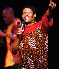 Leader and founder Joseph Shabalala performs with his South African singing group Ladysmith Black Mambazo on April 10, 2005, at Town Hall in New York.