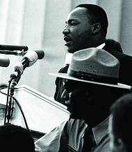 Martin Luther King Jr. (at podium)