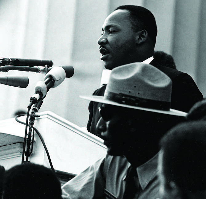 Martin Luther King Jr. (at podium)