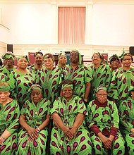 Members of Providence Park Baptist Church’s Seniors Ministry show off their dresses made from West African cloth. The dresses, which feature the ministry’s colors of lime, green and purple, represent a tribute to the members’ African heritage and symbolize their efforts to promote African-American history and culture during February and throughout the year. Joining them last Sunday is Dr. Jerome C. Ross, right, pastor of the church on East Ladies Mile Road in North Side.