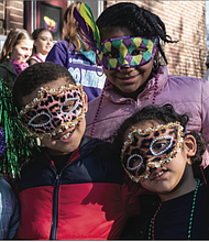 There’s nothing like a colorful mask and beads to get into the spirit of Mardi Gras. youngsters, from left, Kendall Lewis, 5; Qaiden Lewis, 6; Mekiyan Clanton, 11; and Khalil Abraham, 4, are ready for the festivities last Saturday at Dogtown Dance Theatre’s 10th Annual Mardi Gras RVA, which kicked off with a parade.