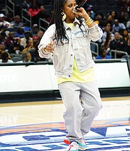 Rapper Rapsody throws down a solid groove during halftime of the men’s final.