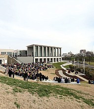 Hundreds of people gather for the dedication and grand opening of the $25 million addition to the Virginia War Memorial that honors those who gave their lives in military service. The ceremony, held last Saturday at the war memorial at 621 S. Belvidere St., featured retired Gen. John P. Jumper of Spotsylvania, former chief of staff of the U.S. Air Force, as the keynote speaker. The
expansion project took two years to complete and includes the new C. Kenneth Wright Pavilion, a 25,000-square-foot building, and an expanded Shrine of Memory listing the names of those killed in the wars in Afghanistan, Iraq and other recent military actions. The facility has a new exhibit hall, art gallery and research library, as well as a 350-seat auditorium. The expansion also provides room for the Virginia Medal of Honor Gallery and created an additional 128 parking spaces in a new underground parking deck.