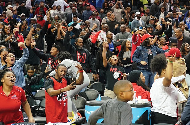 Rams fans raise the roof at the Spectrum Center in Charlotte, N.C., as the Winston-Salem State team pulls out a victory in the final minutes of the championship game.