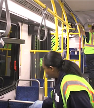 METRO employees at Kashmere Bus Operating Facility clean a local bus