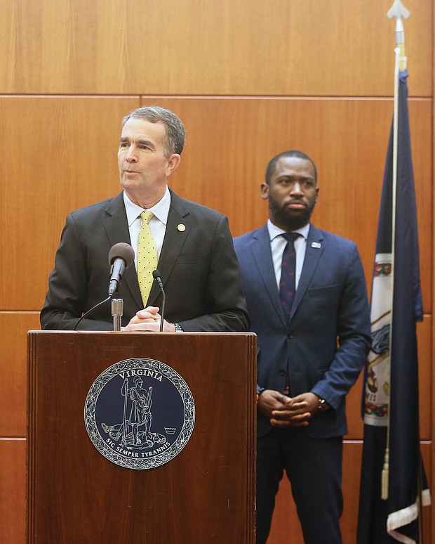 Gov. Ralph S. Northam offers the latest information on the coronavirus and its impact in the state during a news conference Wednesday at the Patrick Henry Building. At the briefing, the governor’s second in a week, he was surrounded by a bevy of state health, hospital and other officials, including Mayor Levar M. Stoney.