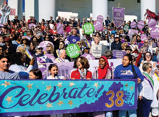 Last Sunday hundreds of women and their supporters, including First Lady Pam Northam, center, celebrate Virginia being the 38th state to ratify the Equal Rights Amendment. The event, Celebrate! 38, included a rally, speakers and a march from Monroe Park to the State Capitol on March 8, International Women’s Day. Thanks to a Democratic majority in the General Assembly for the first time in more than two decades, the ERA was approved in January. Thirty-eight states are needed to ratify any amendment to the U.S. Constitution. But the ERA’s future is uncertain, in part, because the 1982 deadline for ratification enacted by Congress was not met. Attorneys general from Virginia and other states have filed a lawsuit arguing that the deadline was not binding and seek to force federal officials to adopt the measure that would guarantee women equal rights under the law. Speakers at last Sunday’s rally included Kate Kelly, a human rights attorney at Equality Now; Kamala Lopez, founder and co-director of Equal Means Equal; Liza Mickens, the great-great-granddaughter of the renowned banker and women’s empowerment advocate Maggie L. Walker; and Andrea Miller, executive director of the Poor People’s Campaign of Virginia.