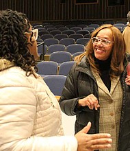 (from left) Ebonie Green, a South Shore resident, talked to Ald. Leslie Hairston (5th) after a March 10, 2020 community meeting about her concern about affordable housing once the Obama Presidential
Center in Jackson Park is built. Photo credit: Wendell Hutson