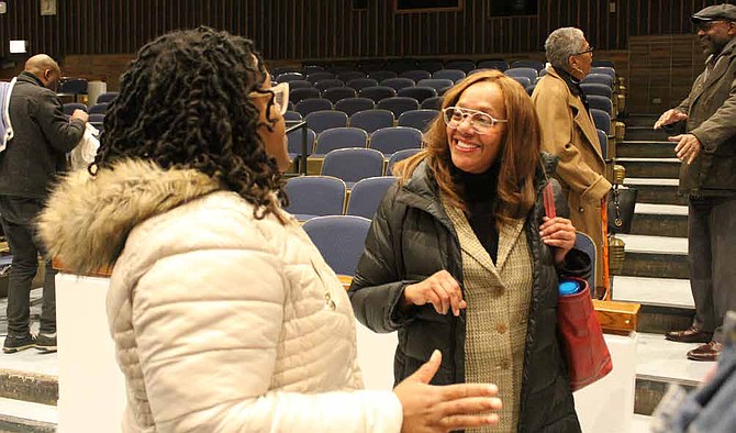 (from left) Ebonie Green, a South Shore resident, talked to Ald. Leslie Hairston (5th) after a March 10, 2020 community meeting about her concern about affordable housing once the Obama Presidential
Center in Jackson Park is built. Photo credit: Wendell Hutson