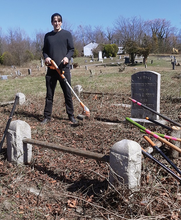 Dr. John Slavin gets ready for more weed whacking at private Woodland Cemetery in Henrico County. He has been volunteering every Sunday for 18 months to help clear overgrown grass, vines and trees and restore the historic, private African-American cemetery that dates to 1916.