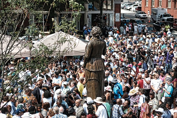 Before:
The unveiling of the statue of Richmond banker and pioneer Maggie L. Walker at Broad and Adams streets in Downtown draws hundreds of people on July 15, 2017, what would have been Mrs. Walker’s 153rd birthday.
