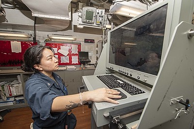 Gas Turbine System Technician (Electrical) 2nd Class Carina Valle, from Houston, operates an integrated computer assessment system during maintenance aboard …