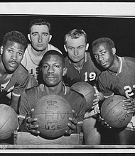 The University of San Francisco’s starting lineup: Bill Russell, seated front center; and left to right, K.C. Jones, Mike Farmer, Carl Boldt and Hal Perry.