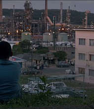 Lokoza: Themba looks over his town and the oil refinery in the Durban South Basin.
