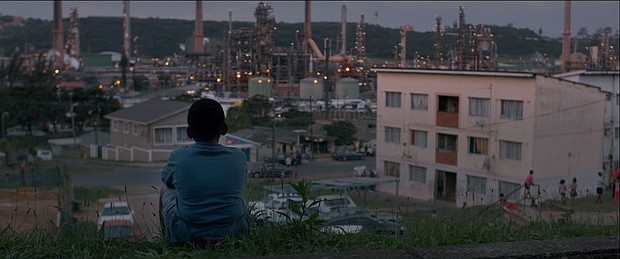 Lokoza: Themba looks over his town and the oil refinery in the Durban South Basin.