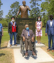 Participants in the late Congressman Mickey Leland statue unveiling at Hermann Park on Saturday, April 25 pose in front of statue. Left to right: Rev. James Dixon, head of Community of Faith Church; J. Kent “Kenny” Friedman, General Counsel and Chief Administrative Officer at Morae Global Corp.; Congresswoman Sheila Jackson Lee; the Rev. William “Bill” Lawson; Alison Leland, Congressman Mickey Leland’s widow; Harris County Commissioner Rodney Ellis; and Mayor Sylvester Turner.
