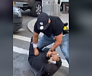 NYPD Officer Francisco Garcia attacks bystander