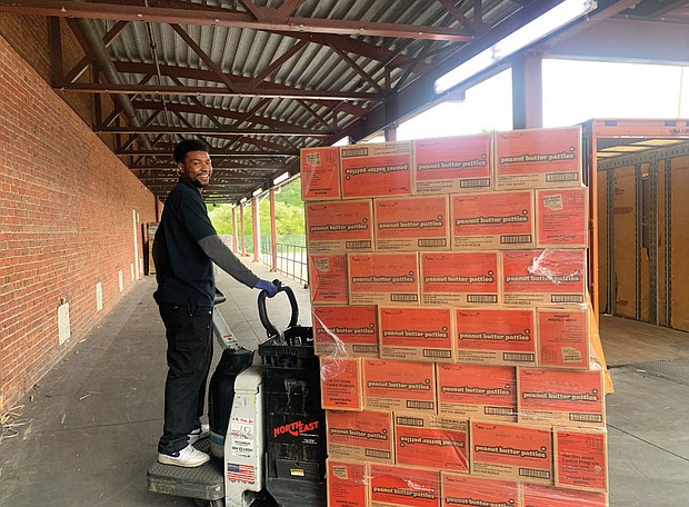 When the COVID-19 pandemic and social distancing measures disrupted plans to sell Girl Scout cookies from booths throughout Central Virginia, that didn’t stop the resourceful Girl Scouts of the Commonwealth of Virginia. The organization, with 17,400 scouts in the region, has donated 1,000 cases of Girl Scout cookies to Feed More, the area’s largest food bank. That’s 12,000 boxes of Thin Mints, S’mores, Trefoils and Lemonades and other popular cookie flavors that will be distributed to families and individuals in need during this critical time. Here, employees of Dunmar Moving Systems deliver the Girl Scout cookies on Wednesday to the Feed More warehouse in Richmond’s North Side.