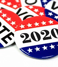 Closeup of voting pins for 2020 elections.