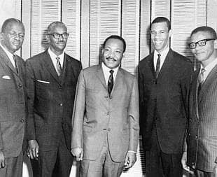 Rev. Lawson, second from right, with Dr. Martin Luther King Jr., middle.