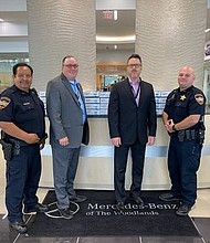 (From left) Deputy Carlos Tavarez, Captain Tim Holifield, Fred Gallucci, Sales Manager at Mercedes-Benz of the Woodlands and Deputy Eric Medina picking up 10,000 FDA approved masks to utilize in the community.