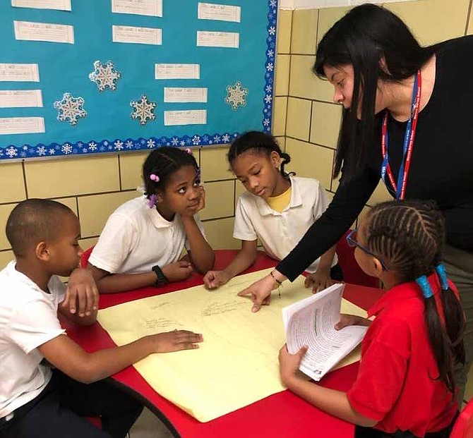 Michelle Silva is shown with her students before schools were closed for the remainder of the year. Photos provided by Chicago Public Schools