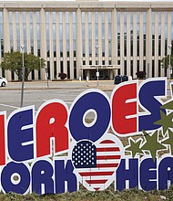 This sign in front of the Main Post Office on Brook Road in North Side salutes the let- ter carriers, clerks and other postal workers who have quietly but steadfastly continued to deliver mail and packages during the pandemic. They are among the ordinary, often overlooked workers who have helped maintain some semblance of normalcy during the COVID-19 shutdown — from restaurant workers to construction crews and road pavers, truck and transit drivers, agricultural workers and a host of others who have soldiered on despite the risks. The sign celebrating postal workers may have heightened significance as the U.S. Postal Service pleads for a bailout from Congress due to a rising tide of red ink. So far, new funding has not been forthcom- ing amid growing concern about the public mail operation’s financial health and ability to sustain its operations given its losses since the coronavirus hit.