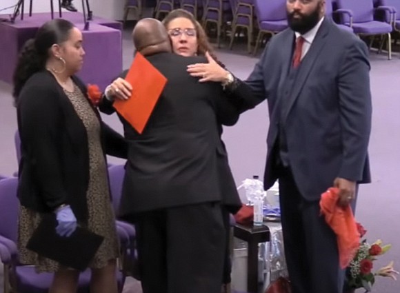 Mother Marcietia S. Glenn, first lady of New Deliverance Evangelistic Church in Chesterfield County, is comforted during the funeral last ...