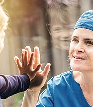 Photo courtesy of Getty Images (Nurse and child)