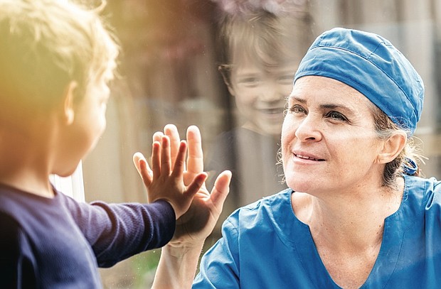 Photo courtesy of Getty Images (Nurse and child)