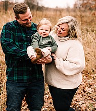 Andrew Goette (left) with his wife, Ashley, and son, Lennon. (Photo by Elle Anne Photography)