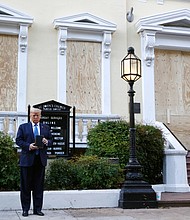 President Trump holds a Bible on Monday outside St. John’s Church across Lafayette Park from the White House. Part of the church was set on fire during rioting Sunday night.