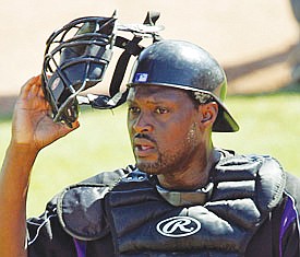 African-American baseball catchers are a vanishing breed.