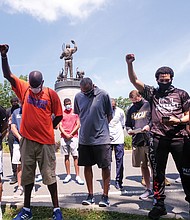 Coaches representing at least 100 schools and various sports participate during last Saturday’s rally and march that started at the statue of tennis great Arthur Ashe Jr. and proceeded down Monument Avenue to the Lee statue. The coaches want to be a voice for change for area youths.