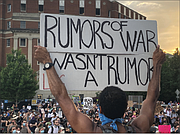 Thousands of protesters flood the area around the Lee statue on Monument Avenue on June 3, the day word spread that Gov. Ralph S. Northam was going to order the state-owned statue to be removed. The official announcement was made by the governor at a news conference the next day.