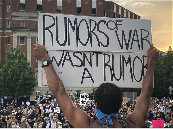 Thousands of protesters flood the area around the Lee statue on Monument Avenue on June 3, the day word spread that Gov. Ralph S. Northam was going to order the state-owned statue to be removed. The official announcement was made by the governor at a news conference the next day.