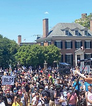 Tavares Floyd of Richmond, council liaison for City Councilwoman Ellen Robertson, speaks at the 5000 Man March last Saturday at the Lee statue about the racial inequities in Richmond and throughout the nation, as well as the “bad apples” within police departments. His cousin, George Floyd, was killed May 25 by a Minnesota police officer, who has since been charged with second degree murder and second degree manslaughter.