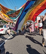 Hundreds of demonstrators march in support of Black Lives Matter and Richmond’s LGBTQ+ community on June 12, the four-year anniversary of the deadly Pulse nightclub rampage in Orlando, Fla., where 49 people were killed.